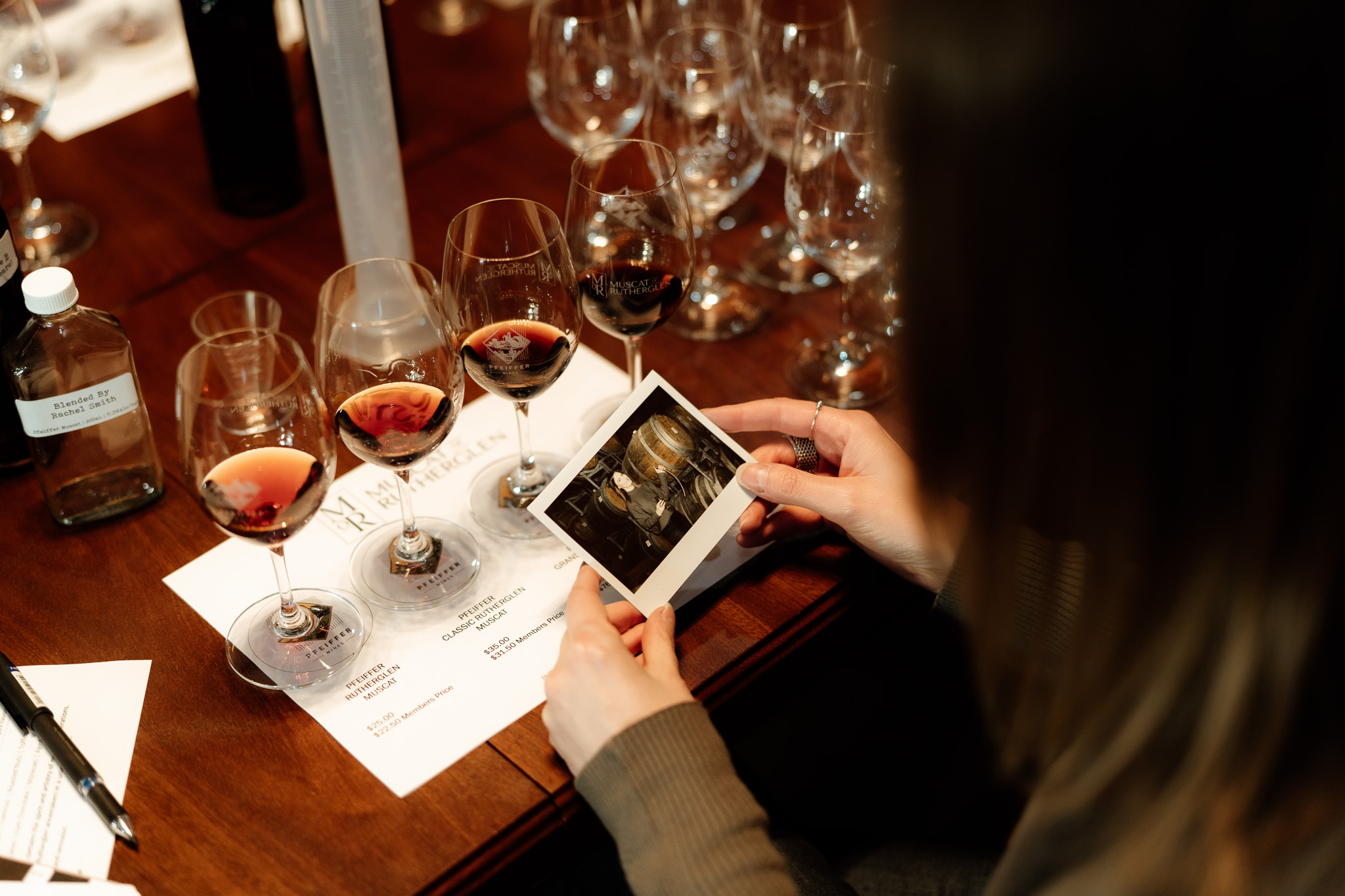 A woman doing wine testing 